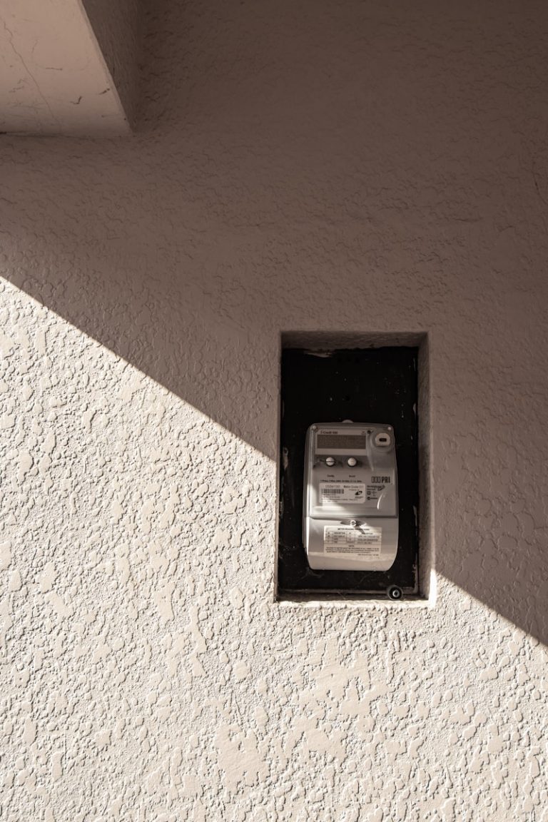 a cell phone that is on the side of a building